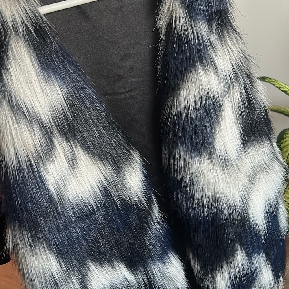 Beautiful fur new vest .